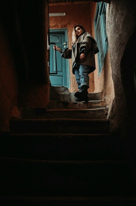 a person standing on a set of stairs